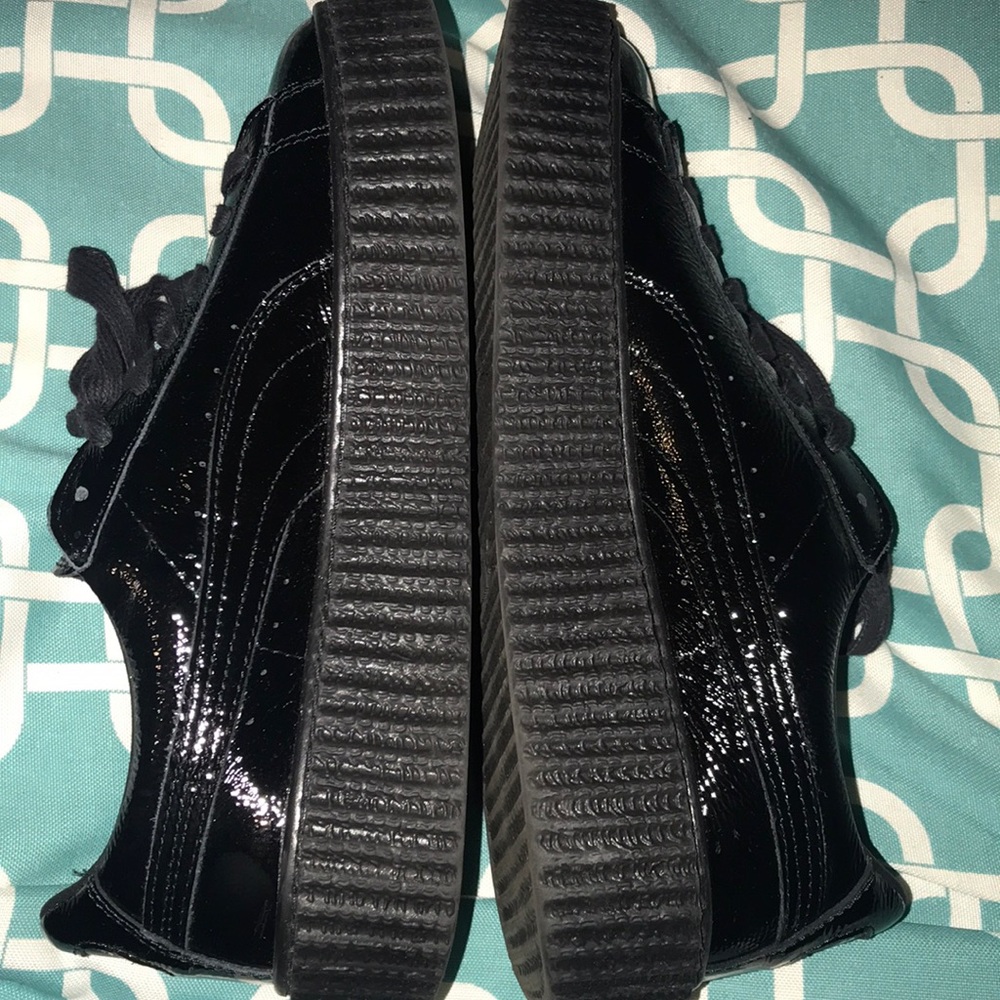 Black shiny Puma Fenty shoes